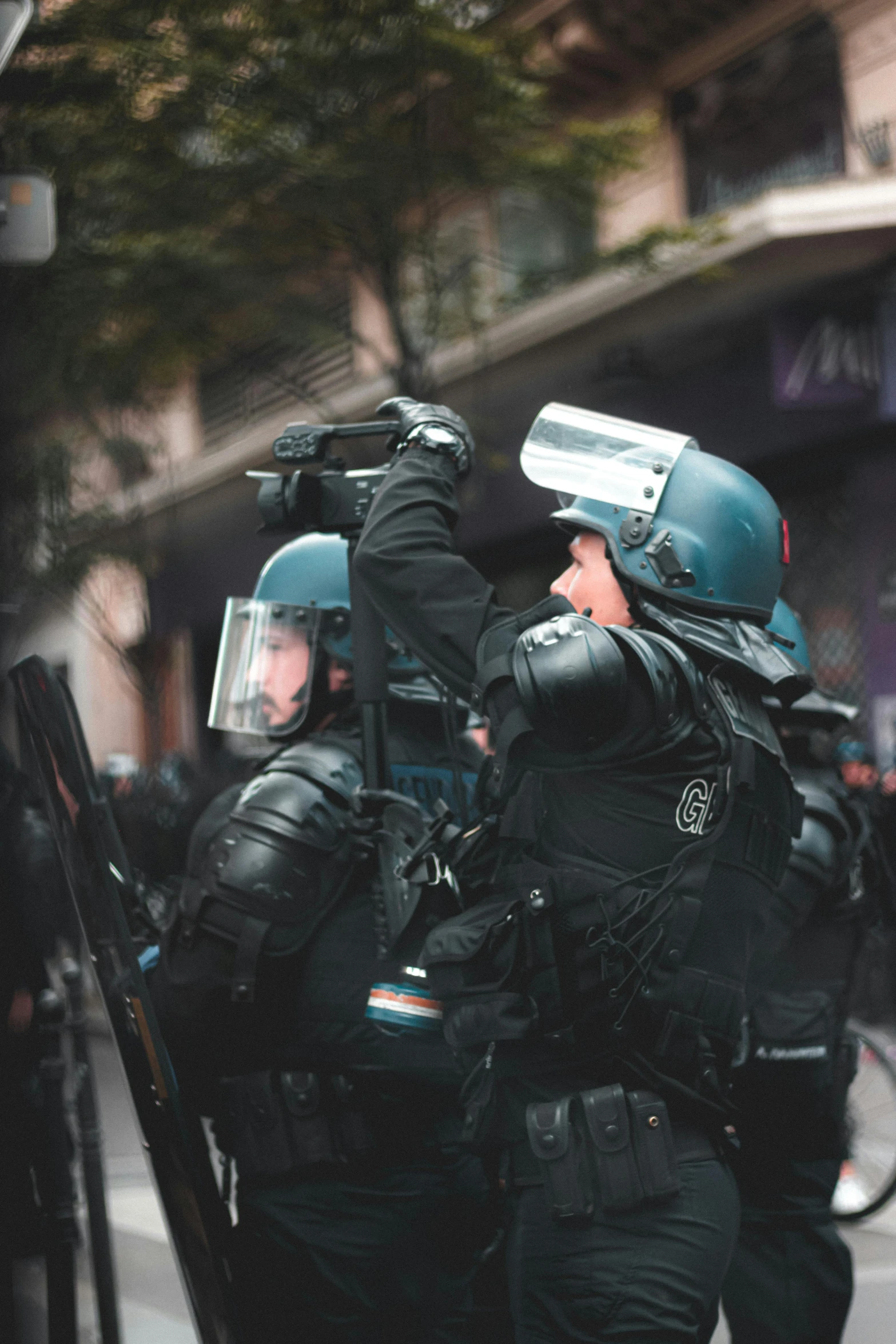 a group of police officers walking down a street, pexels contest winner, renaissance, phone!! held up to visor, armored, 🚿🗝📝