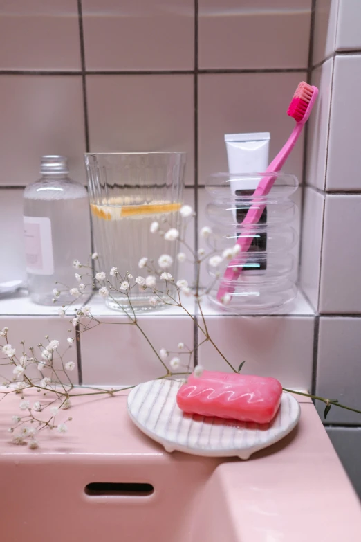 a pink sink sitting in a bathroom next to a mirror, a picture, inspired by Henriette Grindat, instagram, brushes her teeth, soft neon atmosphere, detailed product image, soap