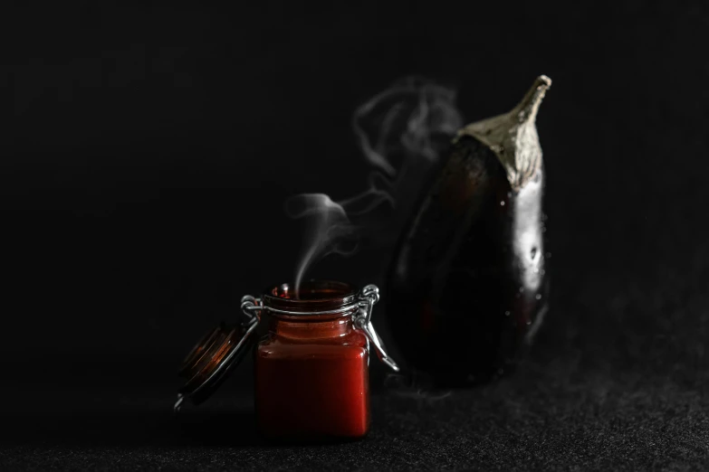 a glass jar filled with liquid next to an eggplant, by Emma Andijewska, renaissance, red smoke, dripping bbq sauce, portrait image, detailed product image