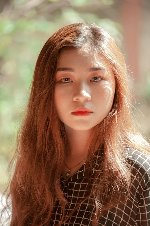 a woman with long red hair posing for a picture, a picture, inspired by Jung Park, trending on pexels, photorealism, young cute wan asian face, afternoon lighting, south east asian with round face, 1 6 years old