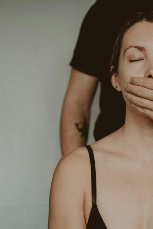 a woman getting a facial massage at a spa, a black and white photo, inspired by Elsa Bleda, trending on pexels, renaissance, fleshy creature above her mouth, woman holding sign, only a mouth with long, secluded