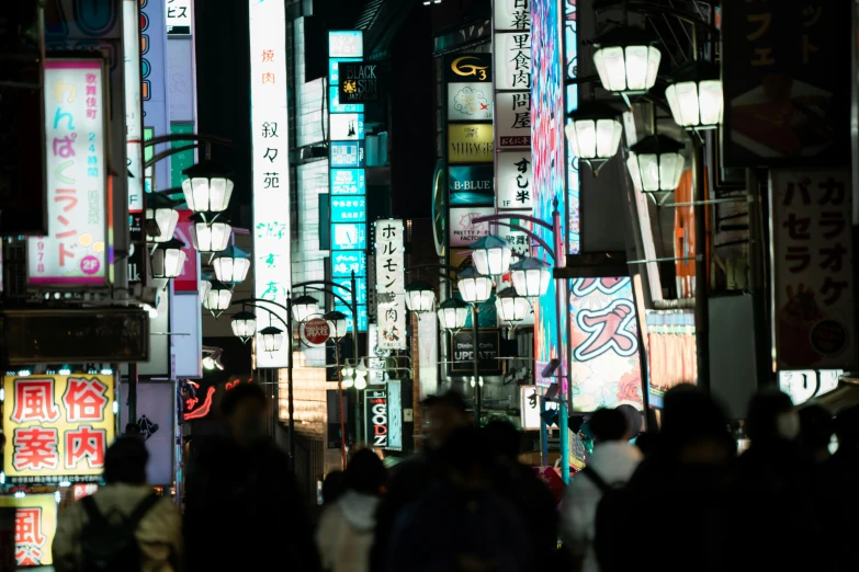 a group of people walking down a street at night, inspired by Shunkōsai Hokushū, trending on unsplash, bright signage, streetlamps, rectangle, ethnicity : japanese