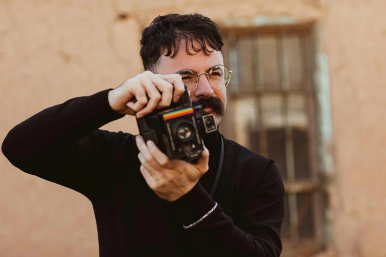 a man taking a picture with a camera, rex orange county, profile image, paul thomas anderson, avatar image