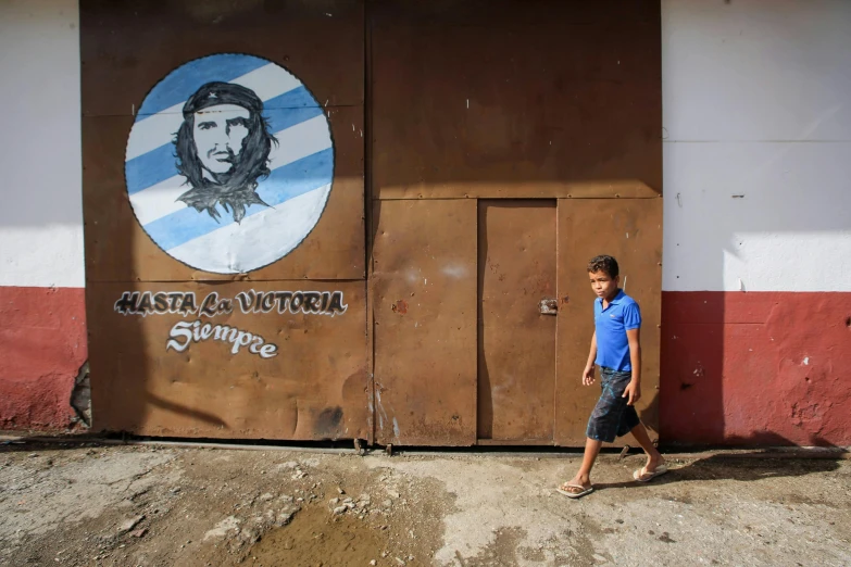 a little boy that is standing in front of a door, street art, che guevara, reuters, square, illustration »