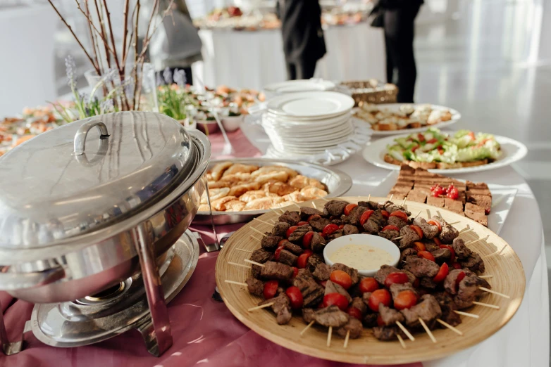 a table topped with lots of different types of food, pexels contest winner, happening, standing elegantly, foil, skewer, white