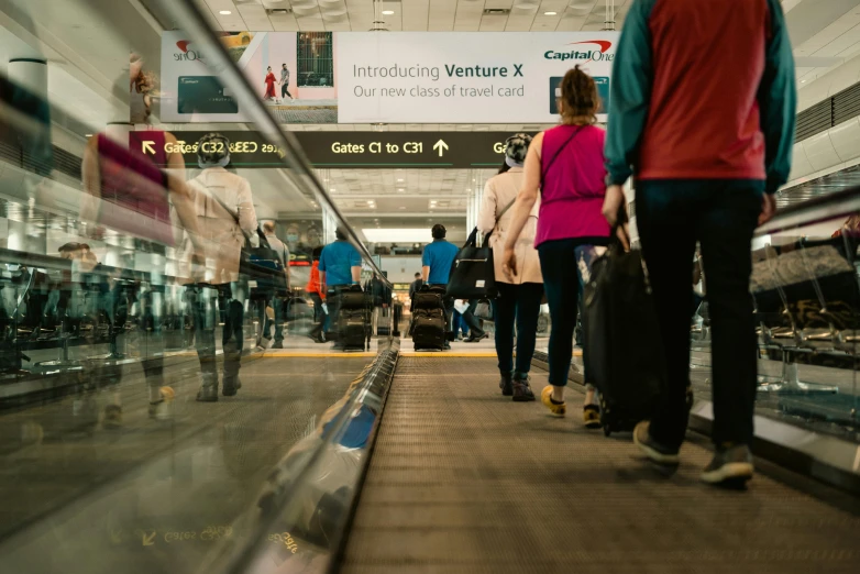 a group of people walking through an airport, by Daniel Lieske, pexels contest winner, happening, avatar image, bags on ground, thumbnail, monitor