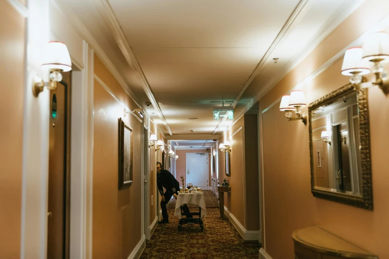 a person walking down a hallway in a hotel, happening, victorian room, profile image, thumbnail