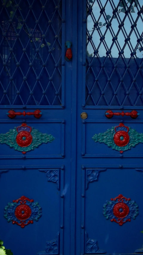 a red fire hydrant sitting in front of a blue door, pexels contest winner, art nouveau, beautiful moorish ornament, 3 doors, multi - coloured, square