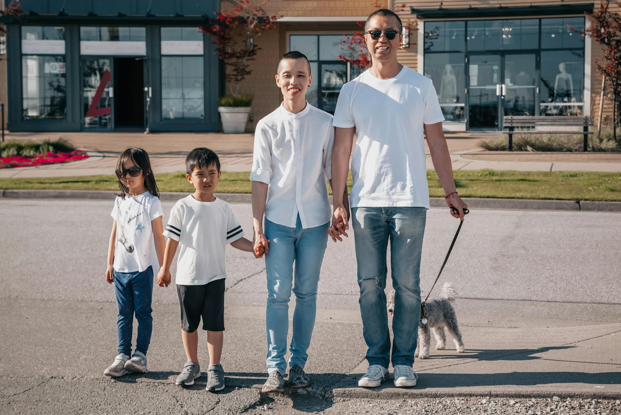 a man standing next to two children and a dog, a picture, pexels, shin hanga, avatar image, darren quach, people outside walk, wearing a shirt and a jean