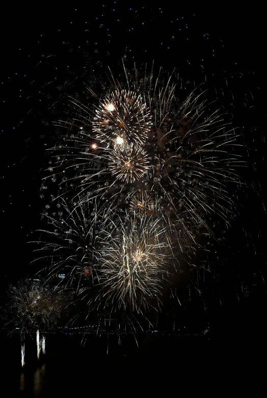 a bunch of fireworks that are in the sky, happening, deeply hyperdetailed, profile image, shot with sony alpha 1 camera, portrait photo