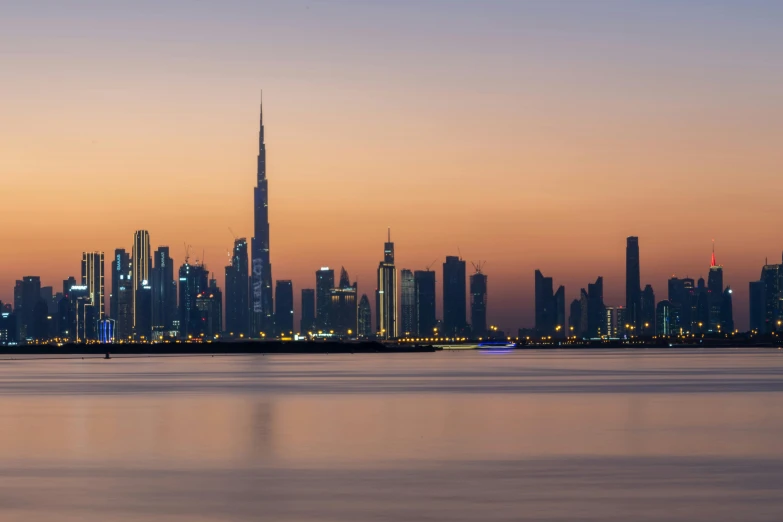 a large body of water with a city in the background, pexels contest winner, hurufiyya, dubai, golden hour”, fine art print, stacked image