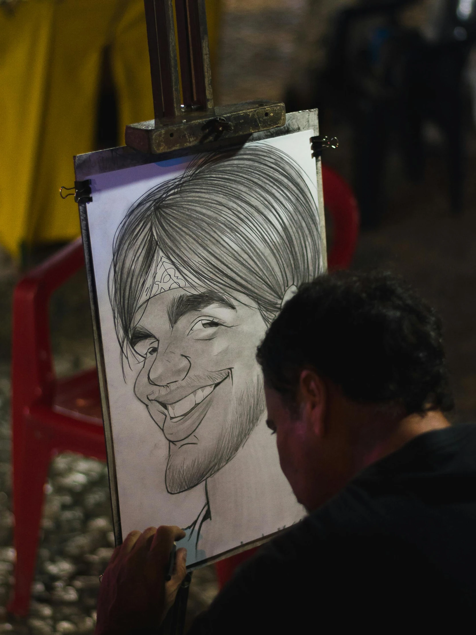 a man is drawing a picture of a woman, a cartoon, by Alejandro Obregón, pexels contest winner, big cheeks, during the night, jair bolsonaro, performing