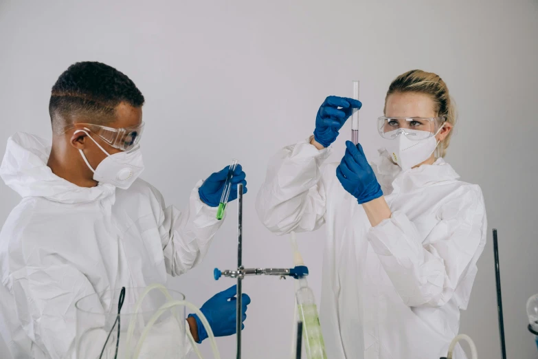 a couple of people standing next to each other in a lab, pexels contest winner, intubation equipment, avatar image, fluids, white