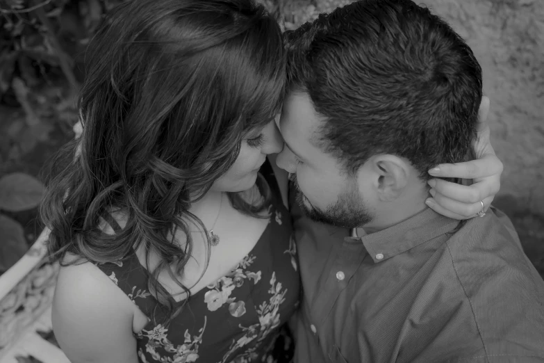 a black and white photo of a man and woman, by Dan Frazier, pexels, renaissance, kissing together cutely, photo from a promo shoot, high details!, grayscale photo with red dress