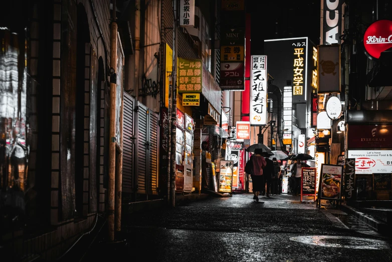 a couple of people walking down a street at night, a photo, inspired by Kanō Naizen, pexels contest winner, ukiyo-e, colorful signs, people with umbrellas, dark abandoned city streets, ethnicity : japanese