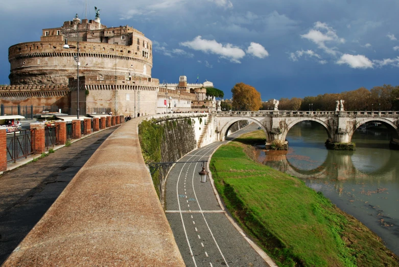 a bridge over a river with a castle in the background, by Cagnaccio di San Pietro, pexels contest winner, roads, sport, vatican, slide show