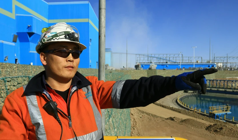 a man in a hard hat pointing at something, gutai group, am a naranbaatar ganbold, biroremediation plant, avatar image, feng zhu |