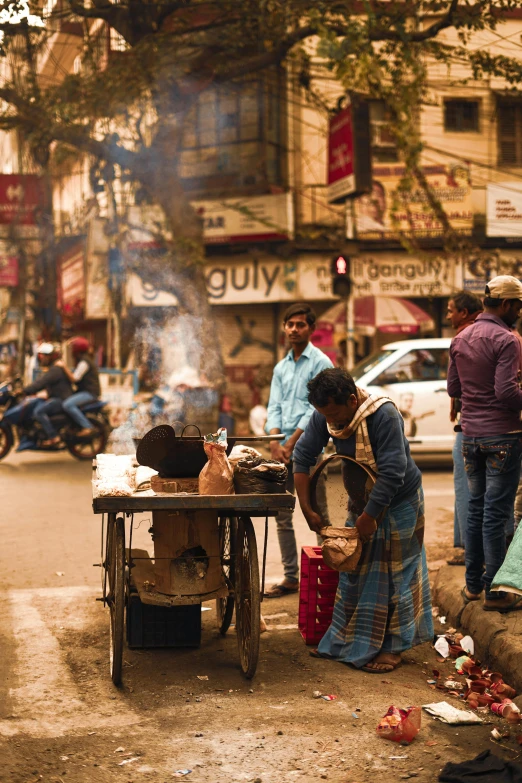 a group of people standing on the side of a road, by Daniel Lieske, trending on unsplash, bengal school of art, with street food stalls, smoldering, offering a plate of food, square