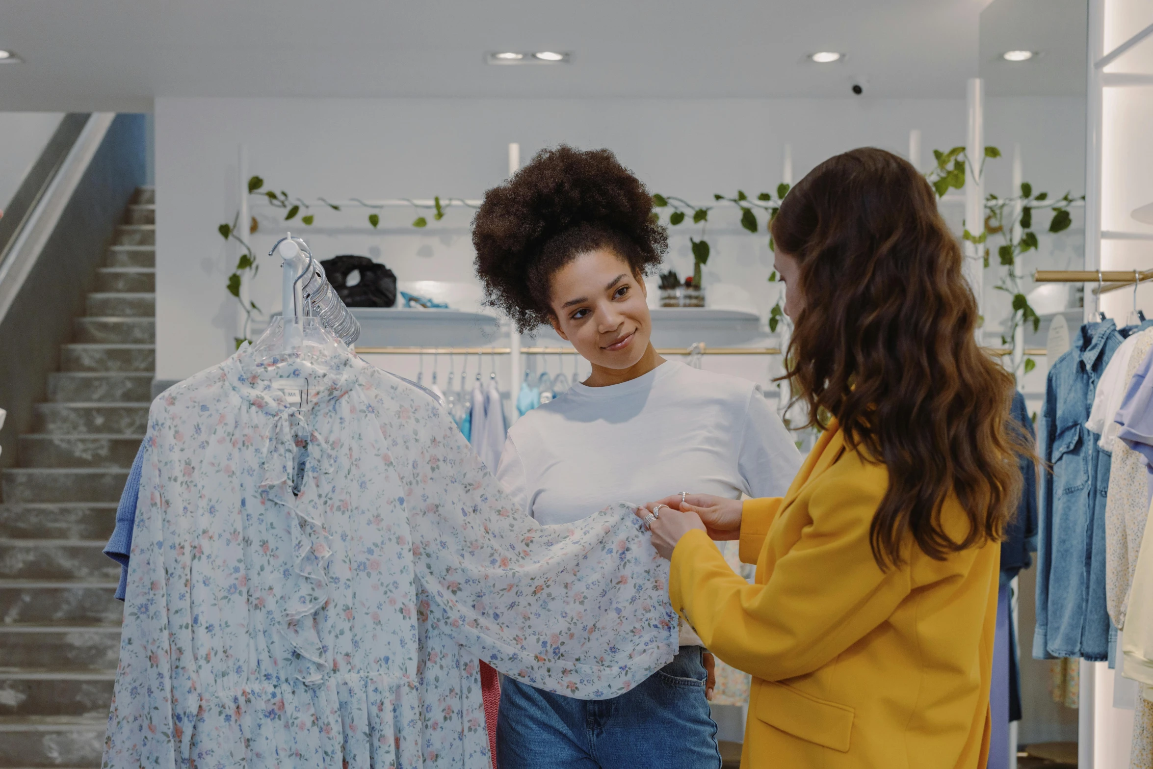 two women looking at clothes in a clothing store, pexels contest winner, wearing a designer top, promo image, thumbnail, inspect in inventory image