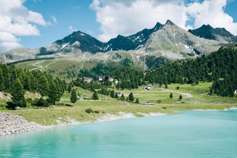 a body of water with mountains in the background, by Werner Andermatt, pexels contest winner, renaissance, turquoise, vouge italy, john pawson, a green