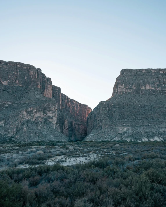 a couple of mountains that are next to each other, by Elsa Bleda, el capitan, in between a gorge, mexican standoff, uncropped