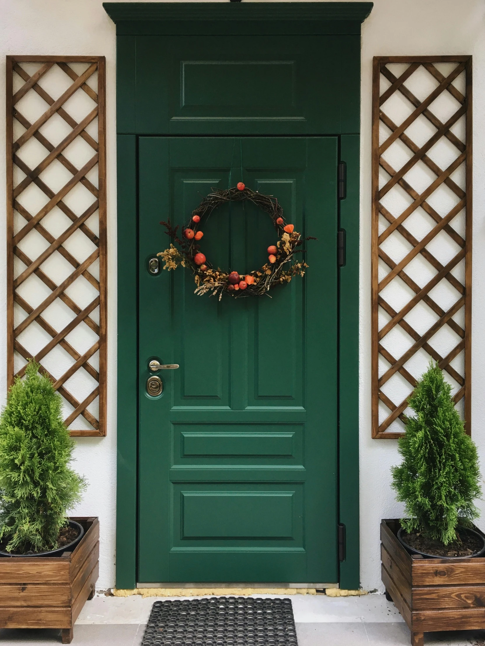 a green door with two planters in front of it, inspired by Mihály Munkácsy, pexels contest winner, folk art, autumn! colors, cyber copper spiral decorations, neotraditional modern minimalist, sukkot