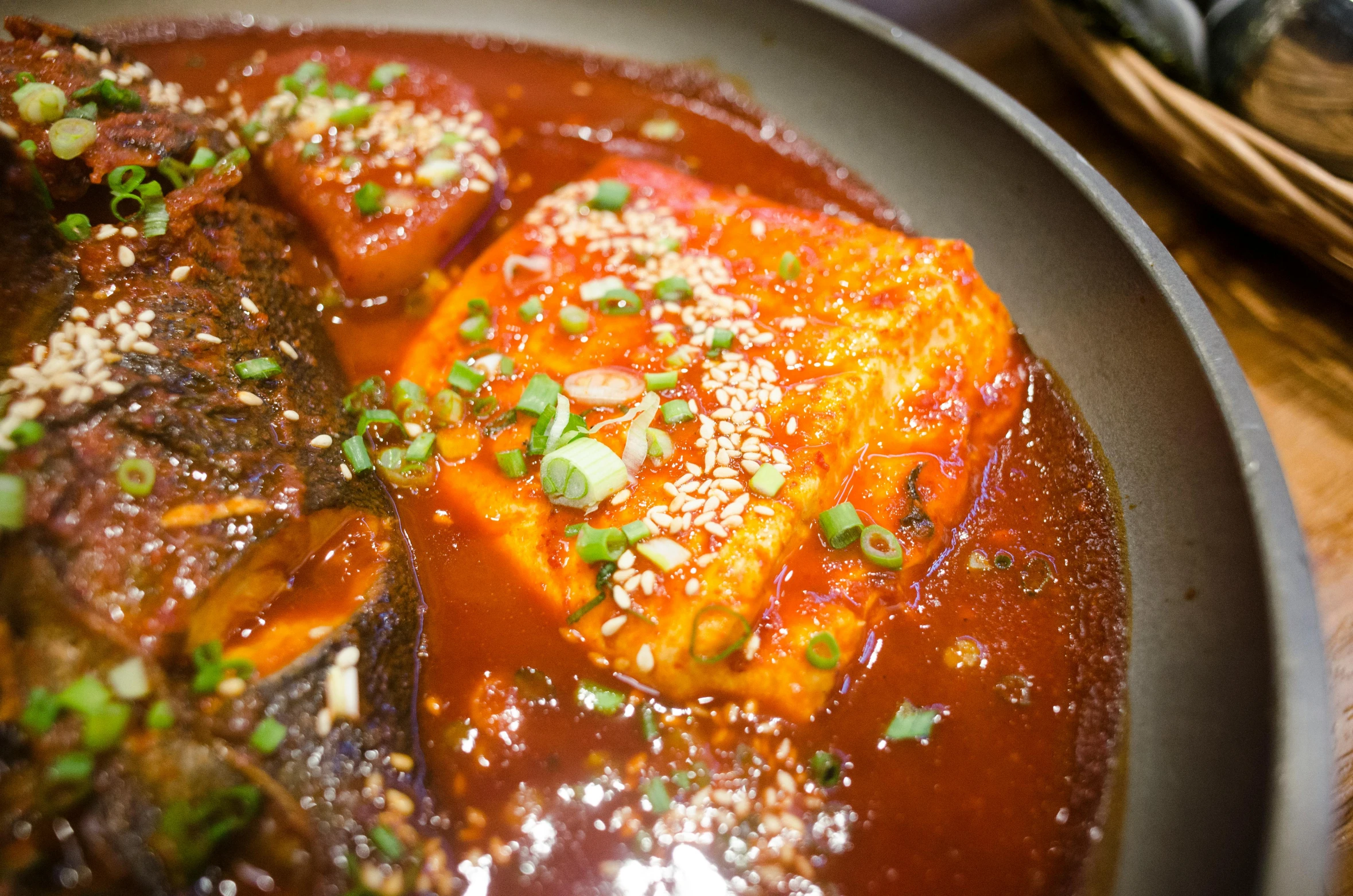 a close up of a plate of food on a table, salmon khoshroo, 王琛, square, spicy