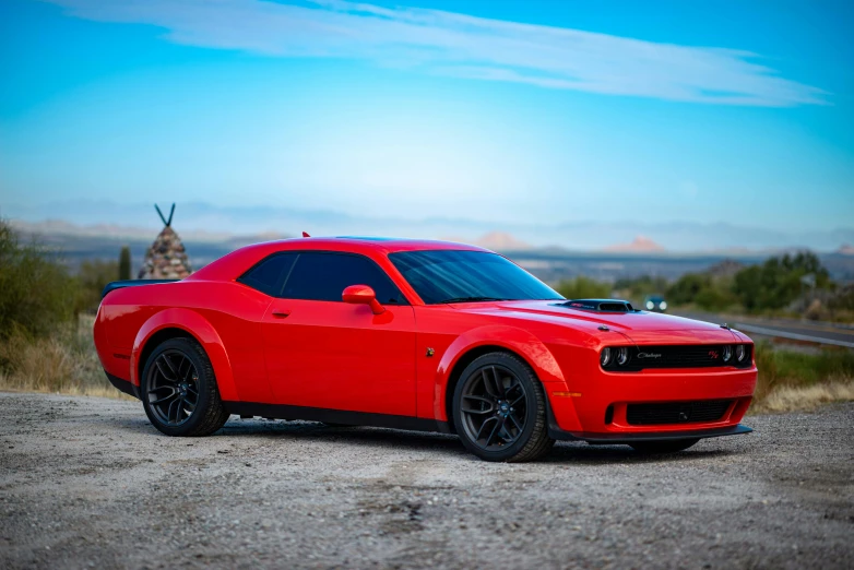 a red car parked on the side of the road, a portrait, by Drew Tucker, pexels contest winner, baroque, big muscle, thicc build, moab, demon