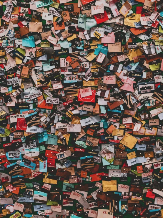 a wall covered in lots of different types of magnets, an album cover, inspired by Andreas Gursky, pexels contest winner, pair of keycards on table, chewing tobacco, 2019 trending photo, padlocks