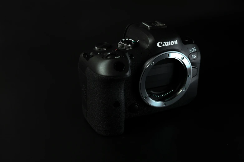 a close up of a camera on a black background, canon eos r 6, fotografia, full body 8k, photography]
