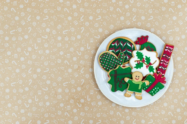 a plate that has some cookies on it, a photo, inspired by Masamitsu Ōta, pixabay, naive art, background image, christmas, wallpaper!, paper cutout