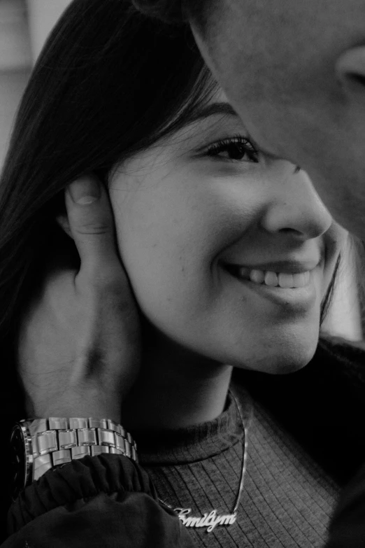 a black and white photo of a man and a woman, a black and white photo, pexels contest winner, photorealism, smiling girl, bw close - up profile face, hands shielding face, 🤤 girl portrait