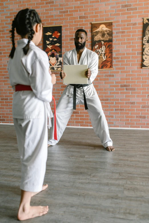 a couple of people that are standing in a room, inspired by Ma Quan, grading, square, high quality paper, duel