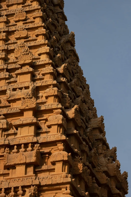 a tall tower with a clock on top of it, inspired by Thota Vaikuntham, renaissance, sandstone, up-close, ochre, medium-shot