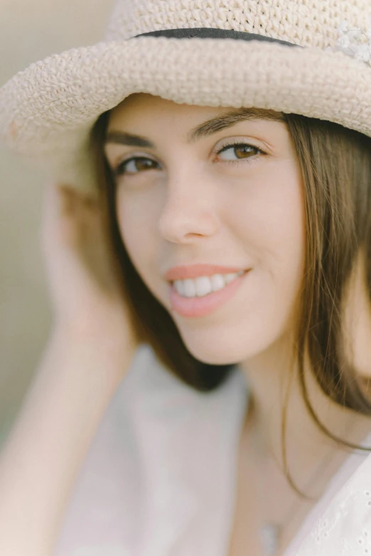 a close up of a person wearing a hat, beautiful and smiling, julia sarda, avatar image, clean image