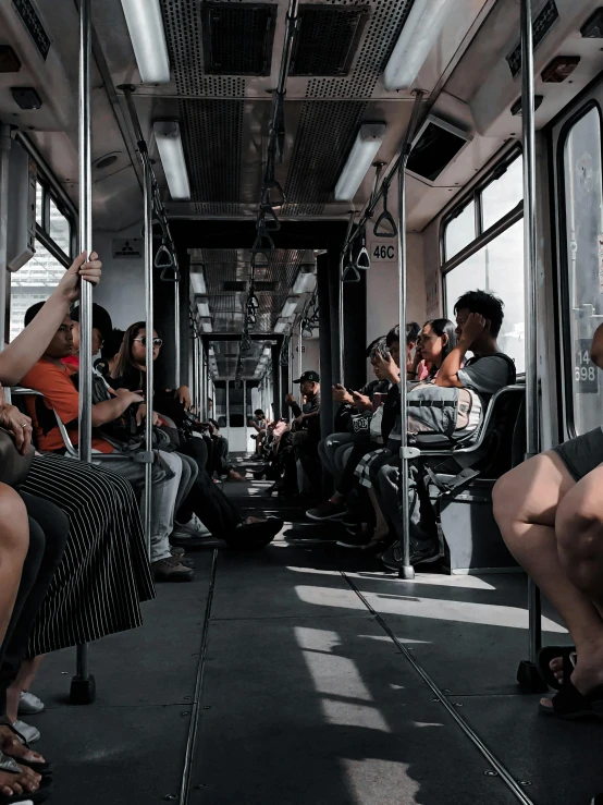 a group of people sitting next to each other on a train, trending on unsplash, hyperrealism, no legs, mexico city, bus, where everyone is an npc