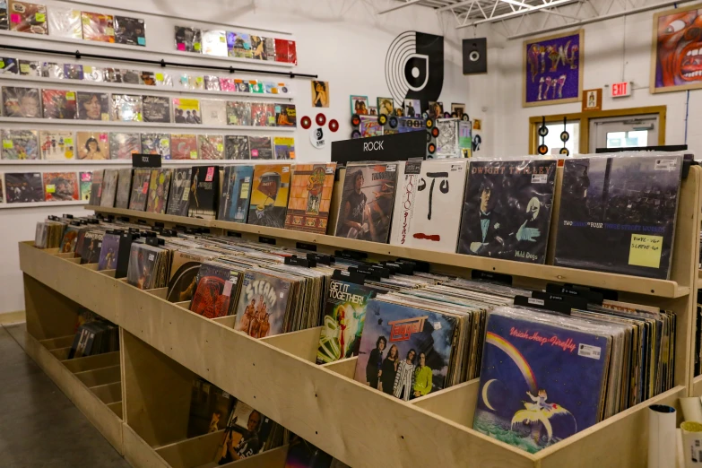a room filled with lots of vinyl records, underground comix, fan favorite, thumbnail, various items, wide shot photograph