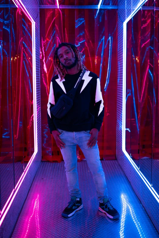 a man standing in a room with neon lights, reflective puffer jacket, riyahd cassiem, lightening, rj palmer