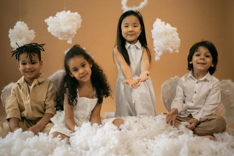 a group of young children posing for a picture, inspired by Louis Le Nain, pexels contest winner, gutai group, white fluffy cloud, decoration, high quality upload, angelic