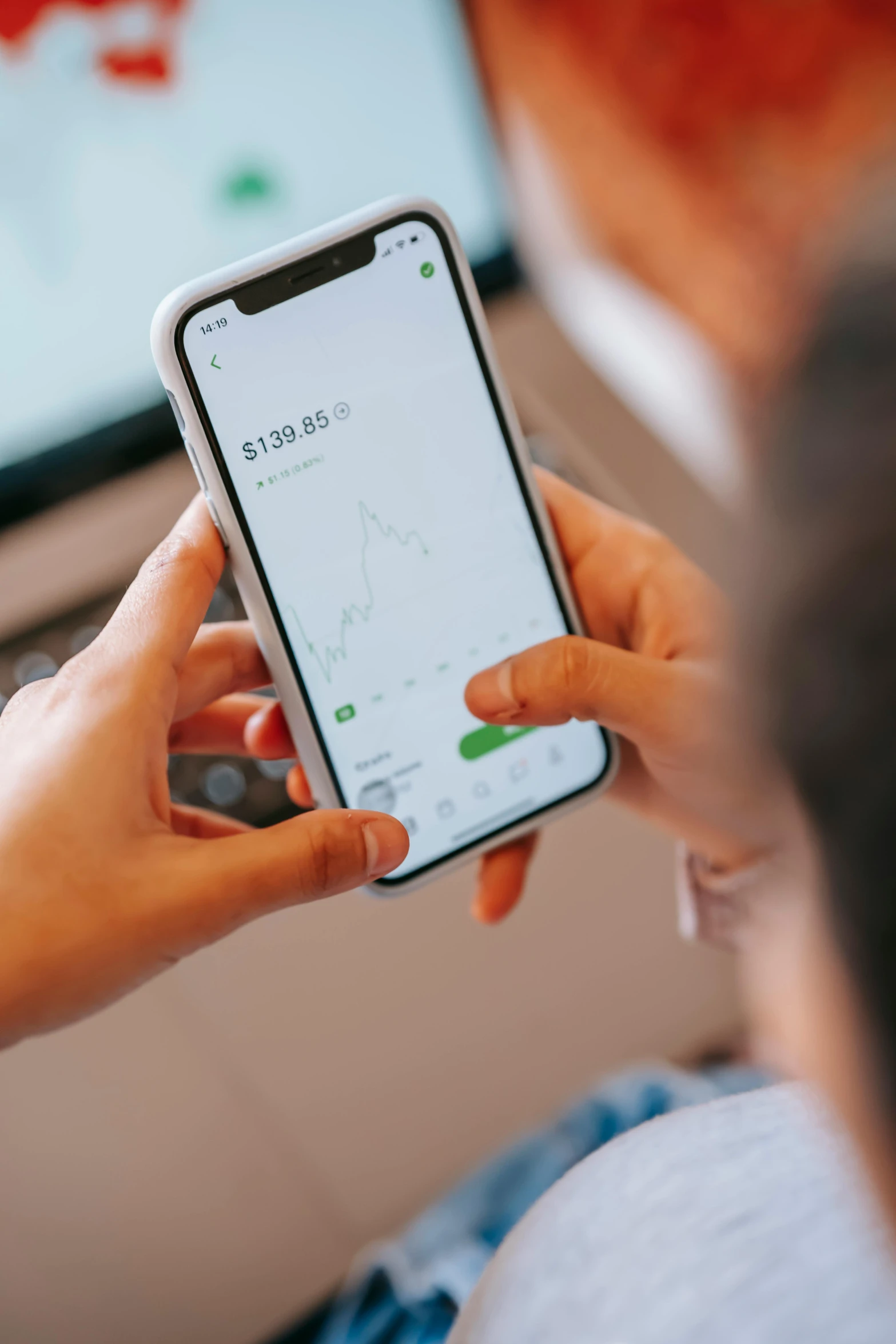 a person holding a cell phone in front of a tv, trending on pexels, cryptocurrency, square, avatar image, woman