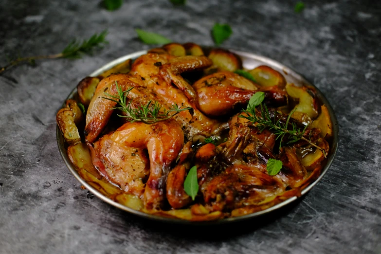 a close up of a plate of food on a table, the greek goddess aphrotite, on grey background, grilled chicken, with a cool pose