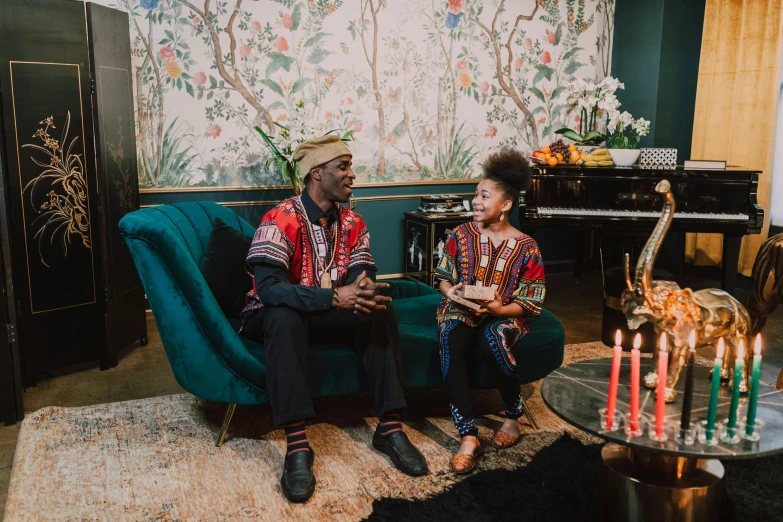 a man and a woman sitting on a couch in a living room, pexels contest winner, black arts movement, ornate attire, with a kid, ashteroth, promotional image