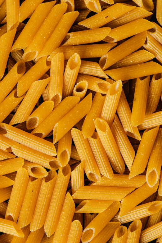 a close up of a pile of pasta, detailed product image, zoomed out to show entire image, crisp and sharp, a tall