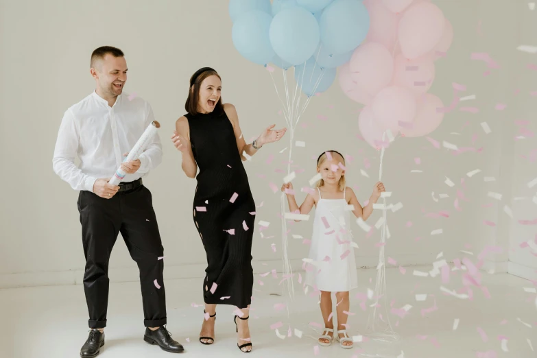 a man and a woman with balloons and confetti, pexels contest winner, private press, portrait of family of three, avatar image, full body image, high quality image