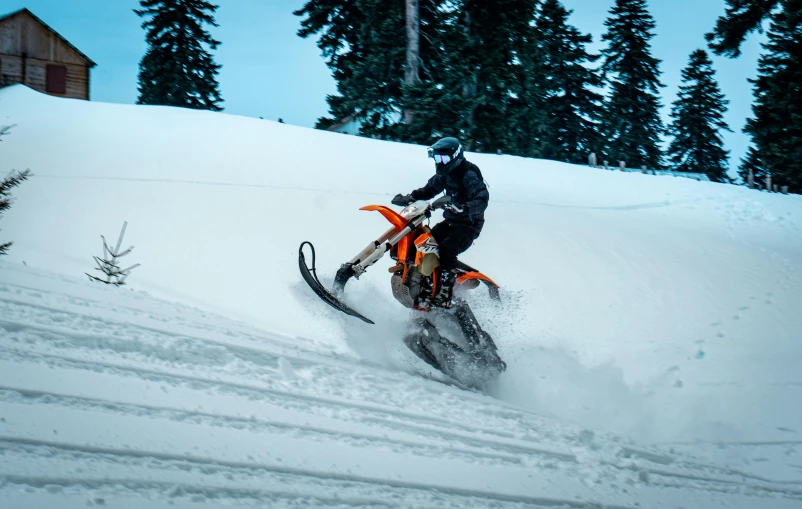 a man riding a snowmobile down a snow covered slope, pexels contest winner, profile image, motorbike, dynamic shot, rectangle