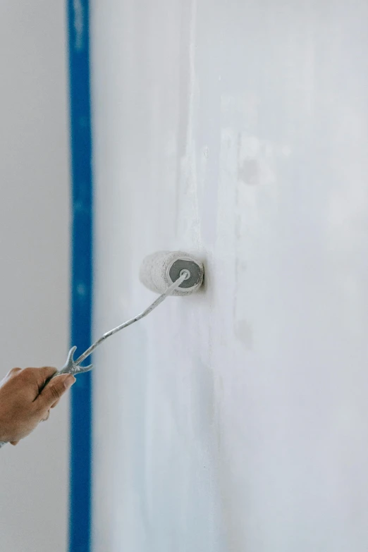 a woman painting a wall with a paint roller, arbeitsrat für kunst, whiteboard, no - text no - logo, pearlescent white, 144x144 canvas