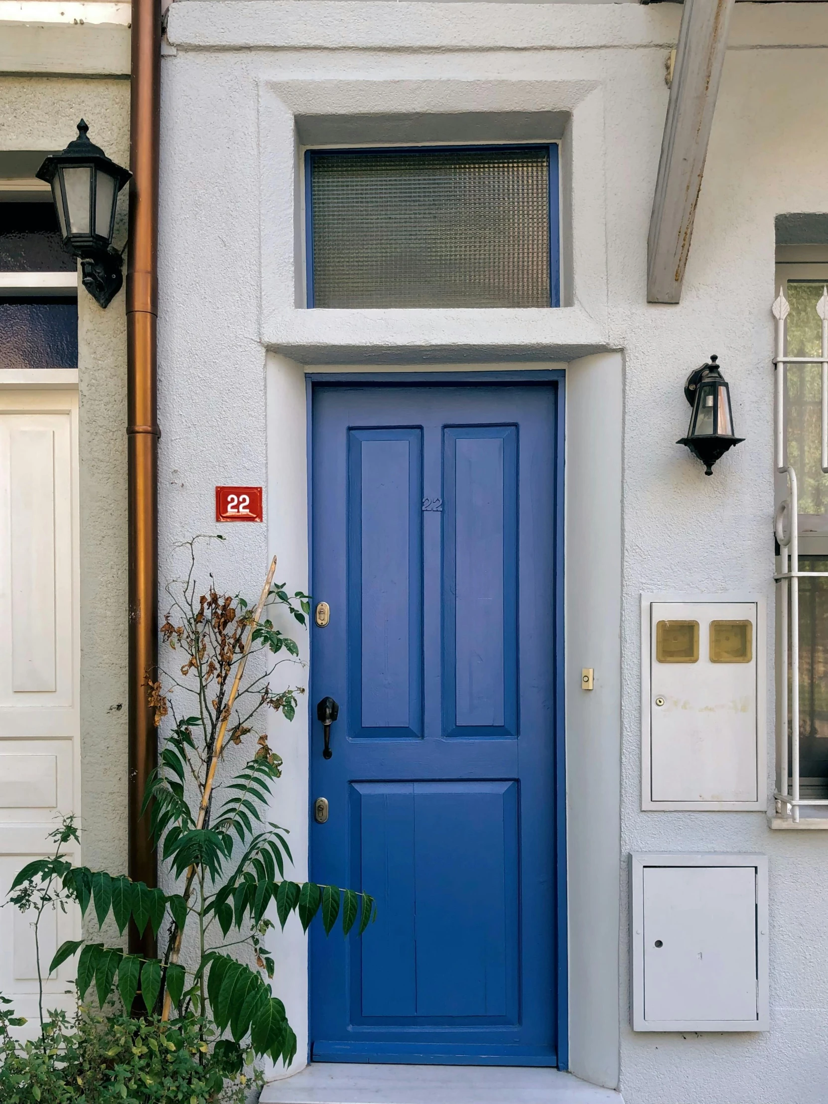 a red fire hydrant sitting in front of a blue door, inspired by Albert Paris Gütersloh, narrow hallway, 🚿🗝📝