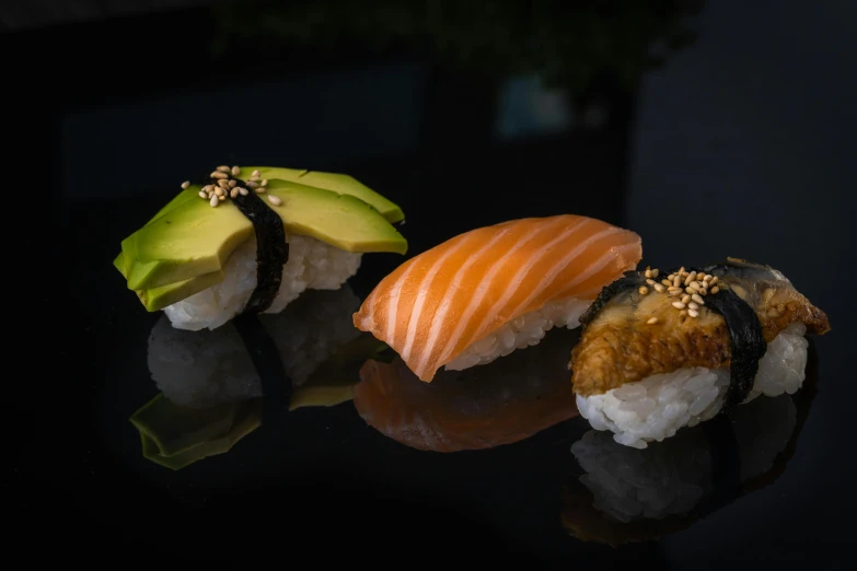 a couple of sushi sitting on top of a table