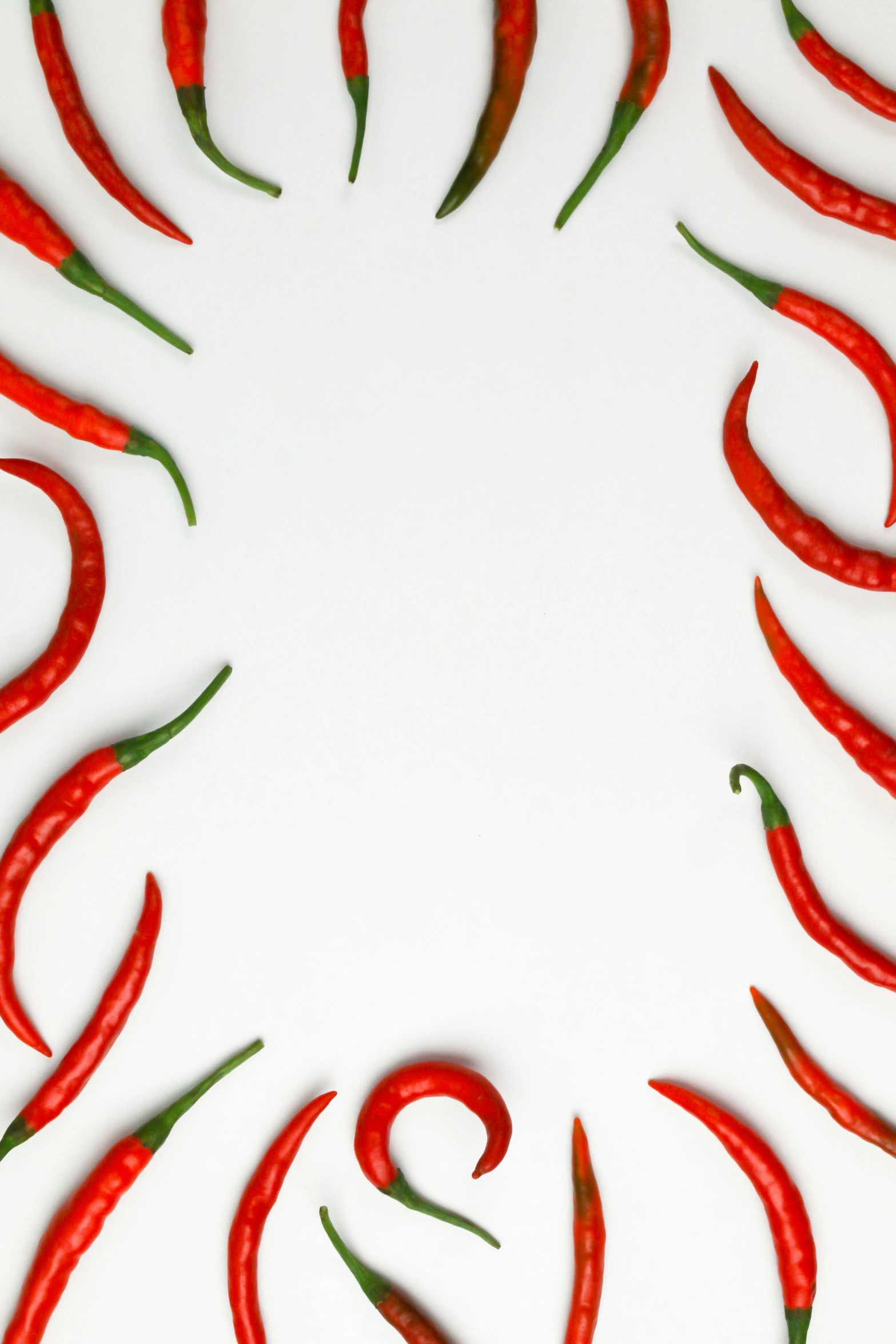 a group of red chili peppers sitting on top of a white surface, inspired by Jan Müller, trending on pexels, frame around pciture, burning, kaleidoscopic, programming