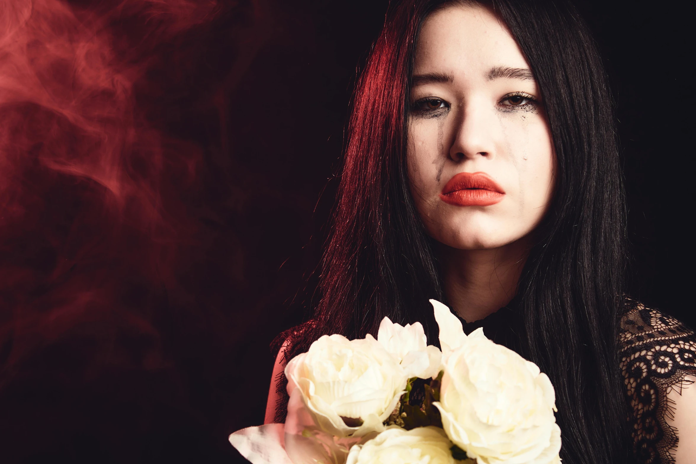 a woman holding a bouquet of white roses, an album cover, inspired by Elsa Bleda, pexels contest winner, portrait of cute goth girl, dilraba dilmurat, red tears, tired haunted expression